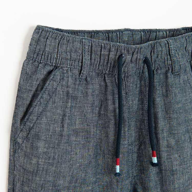 Dark blue trousers with cord