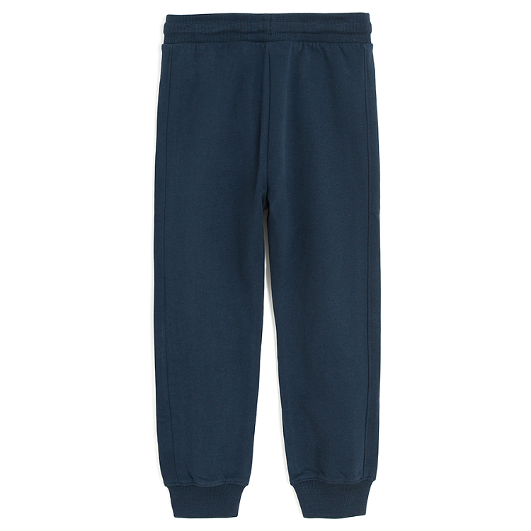 Blue jogging pants with silver stripe