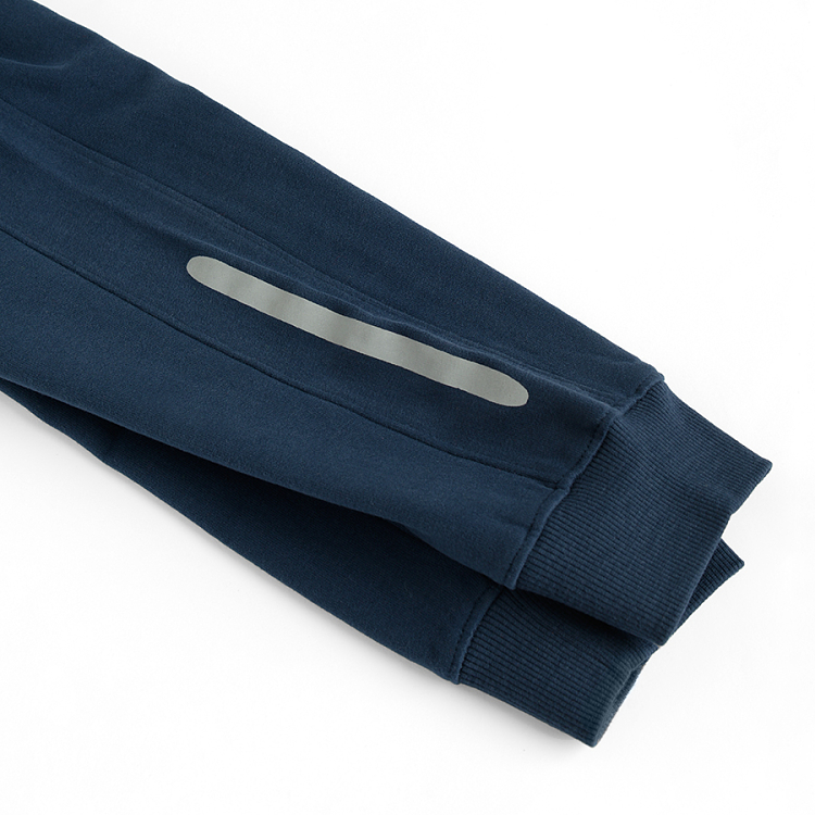 Blue jogging pants with silver stripe