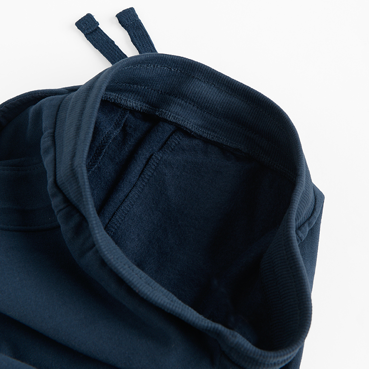 Blue jogging pants with silver stripe