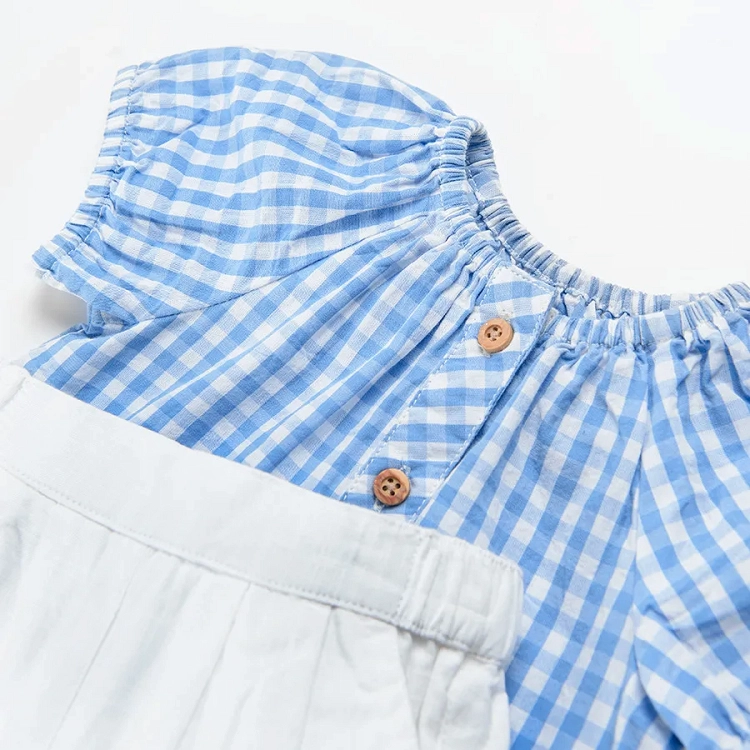 White and blue cheked short sleeve shirt and white shorts set