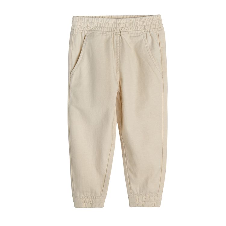 Cream trousers with elastic waist