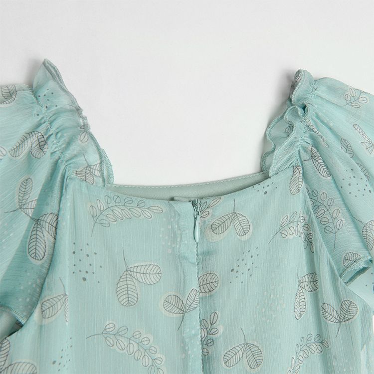 Light green party dress with pleats and leaves pattern