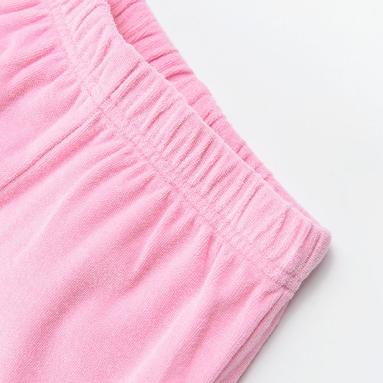 Pink shorts with elastic waist and ruffle