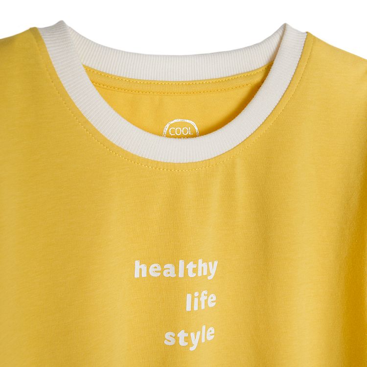 Yellow short sleeve blouse with HEALTHY LIFESTYLE print