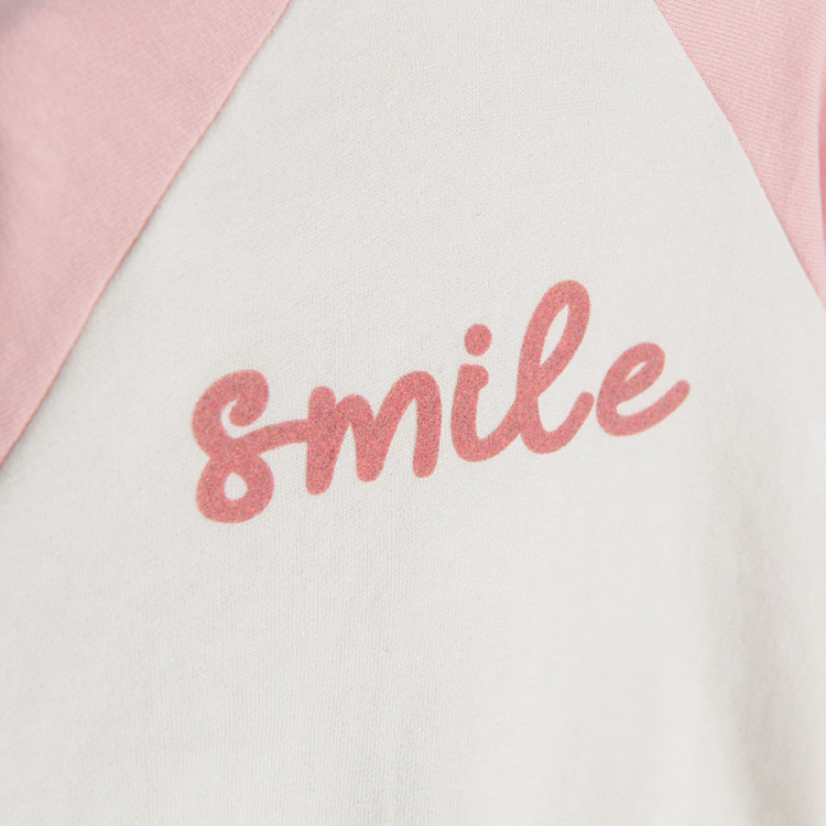 White zip through sweatshirt with pink sleeves