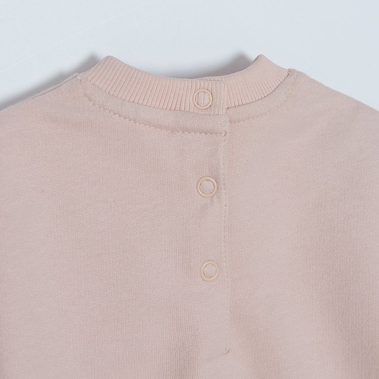 Light pink sweatshirt with embroidered sleeves