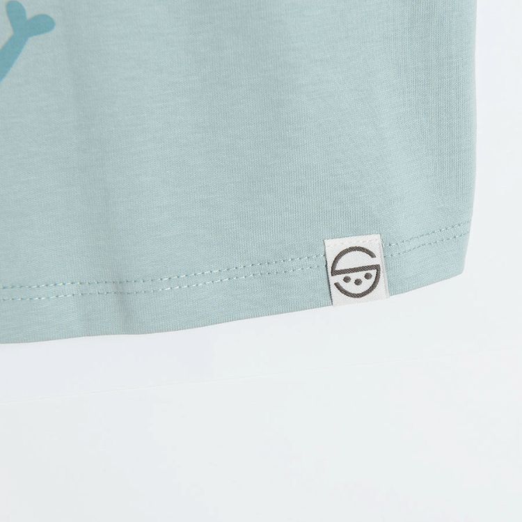 Turquoise short sleeve T-shirt with a dog print
