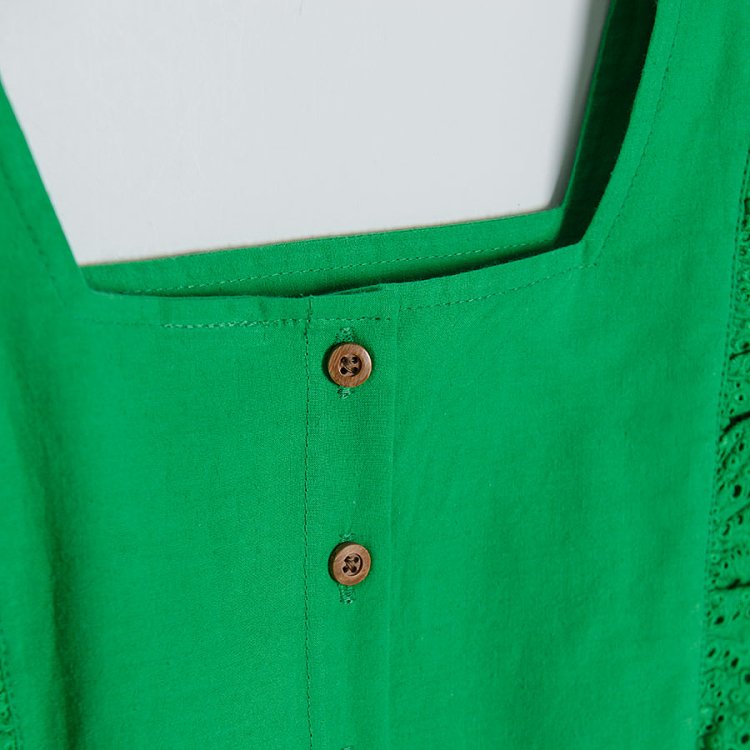 Green dress with ruffles on sleeves
