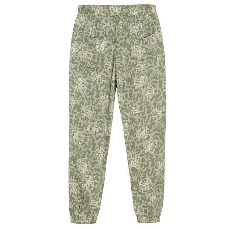 Tuquoise wide trousers with white flower patterns