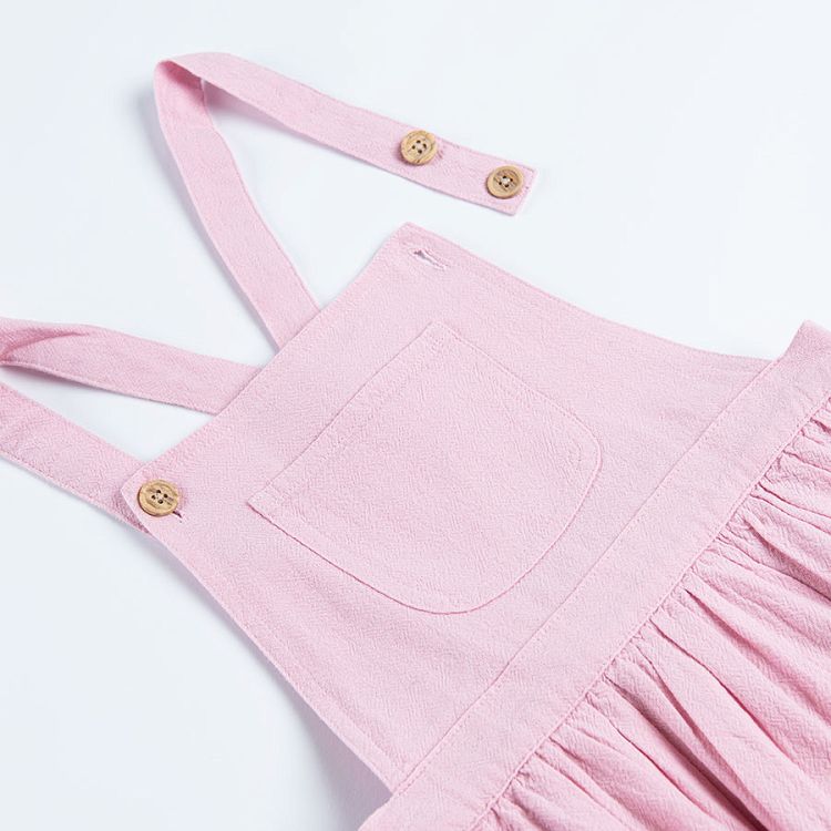 Pink dungaree with shirt and pocket on the top