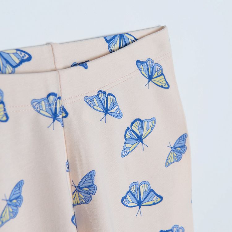 Light pink leggings with butterflies print