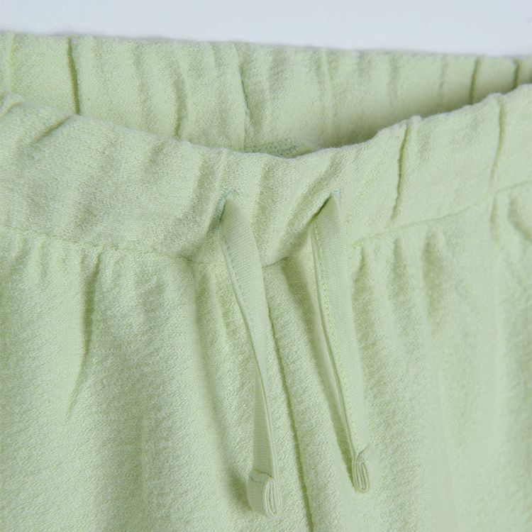 Light green shorts with adjustable waist