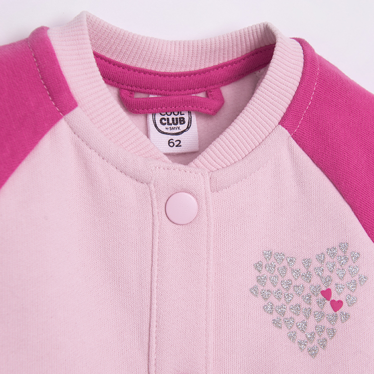 Pink button down sweatshirt with 'Je t'aime' print on the back