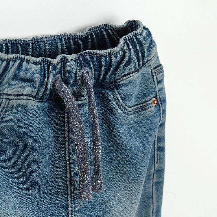 Denim trousers with fleece lining