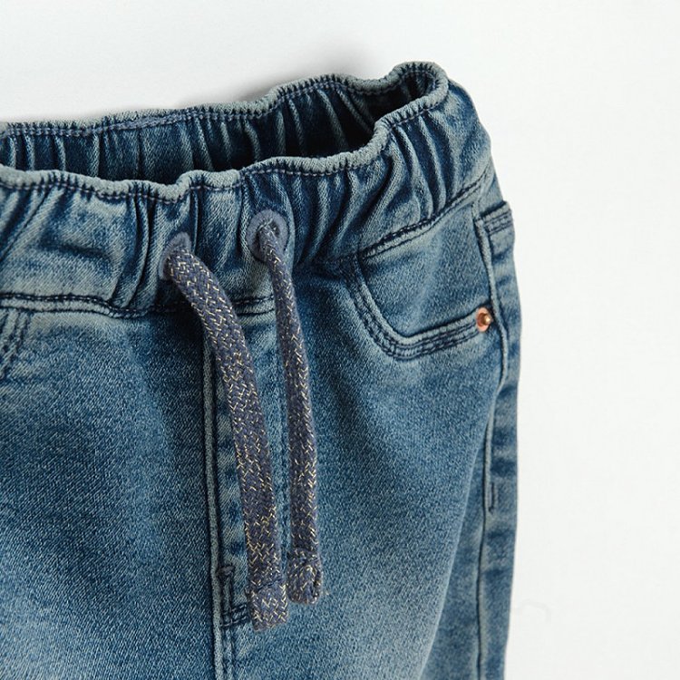 Denim trousers with fleece lining