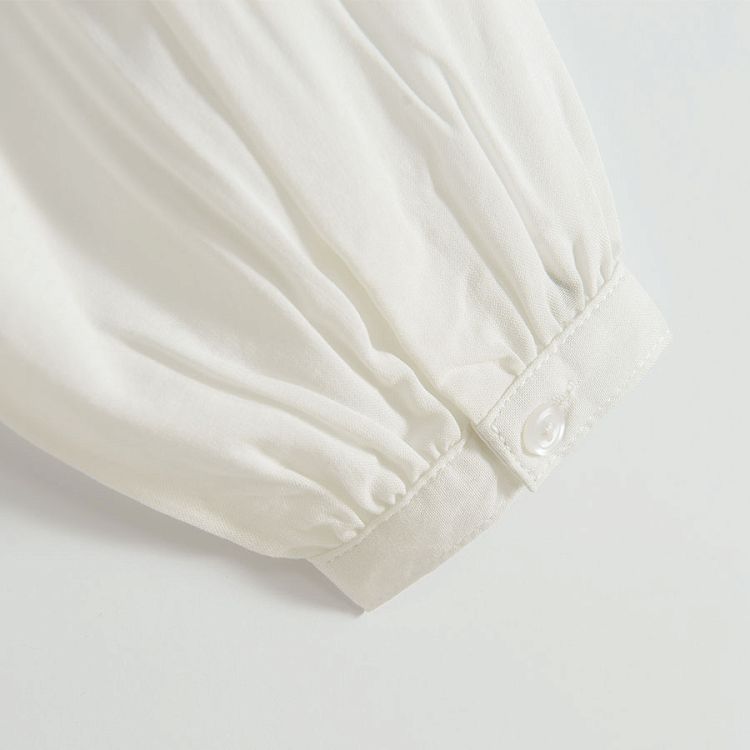 White long sleeve shirt with raffles