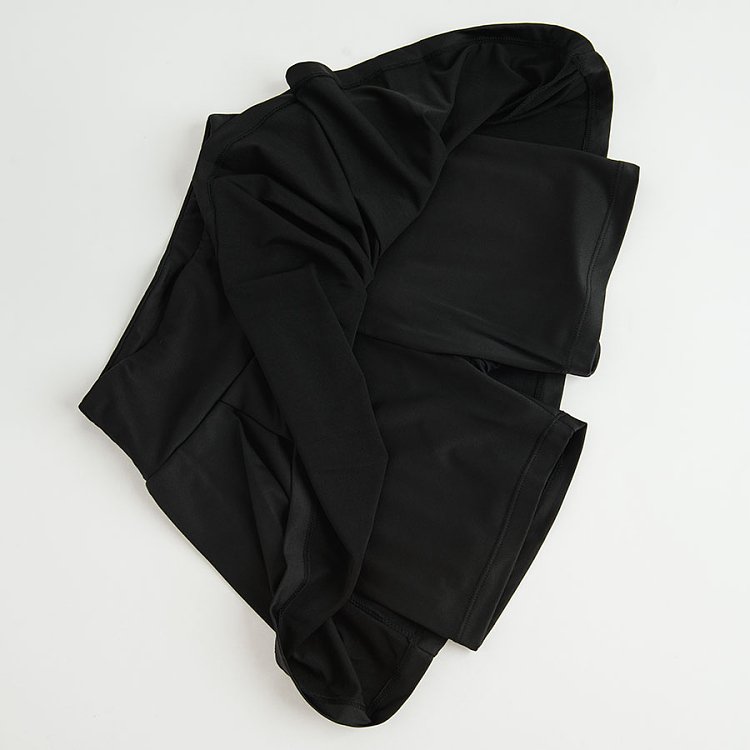 Black shorts with pleated skirt on top