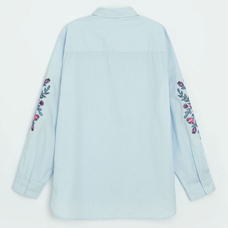 Light blue shirt with long floral embroidered sleeves