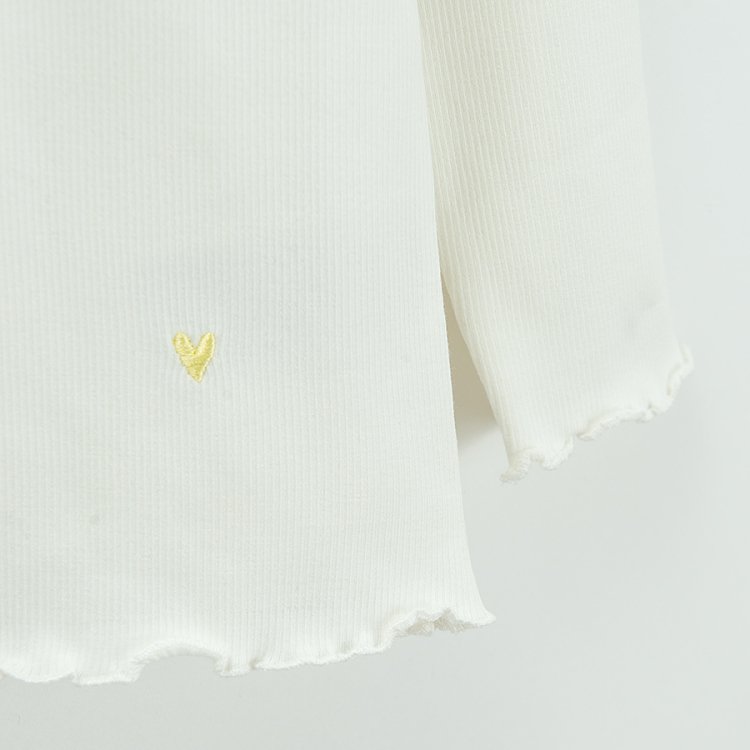 White long sleeve blouse with hearts print