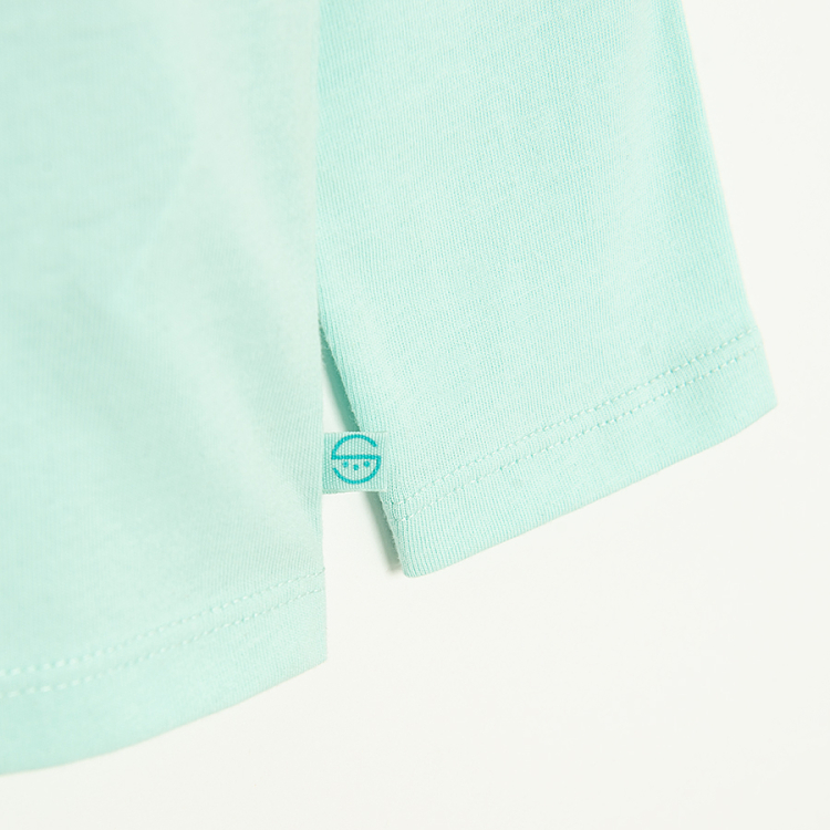 Mint long sleeve blouse with big daisy print Good vibes