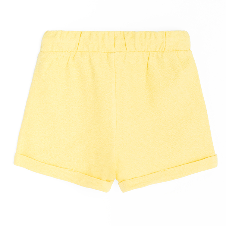 Yellow shorts with cord on the waist
