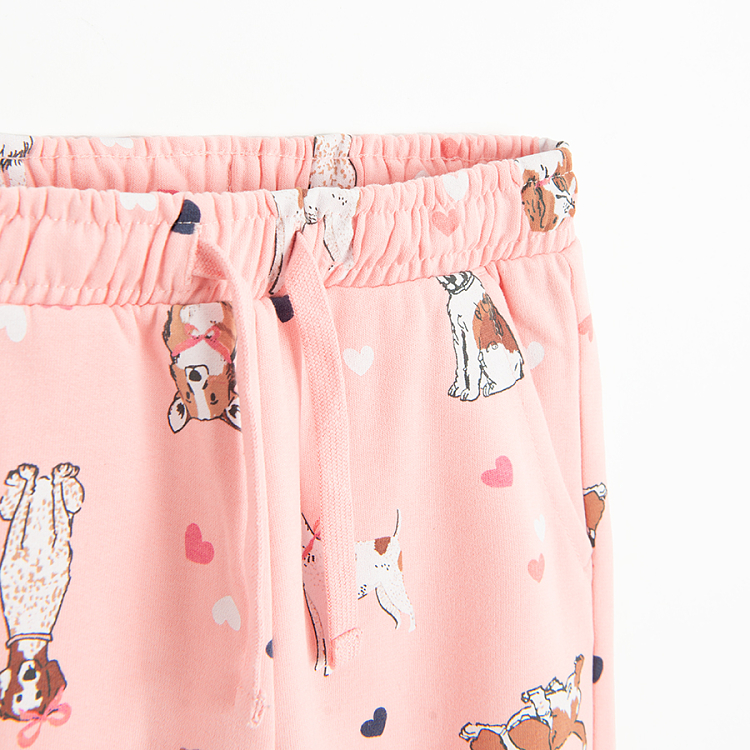 Pink jogging pants with dogs print