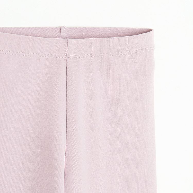 Violet leggings with plam fruit on the knees