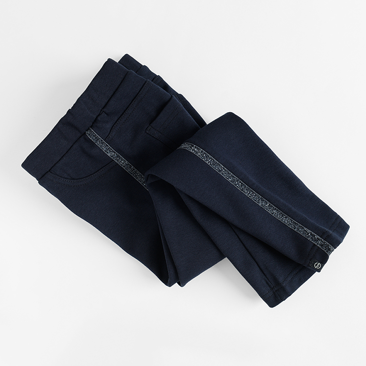 Blue jeggings with gold stripe