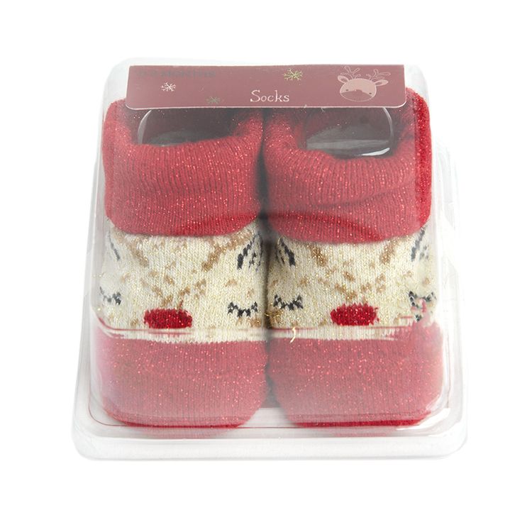 Ecru and sparkly red socks with raindeer print