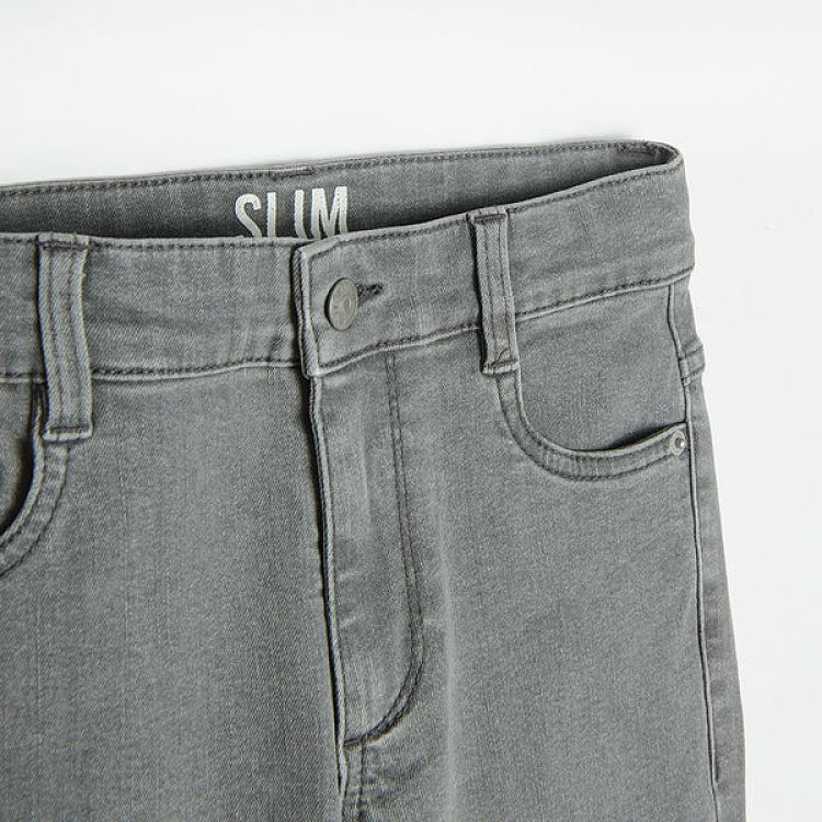 Grey denim trousers with buttonand zipper