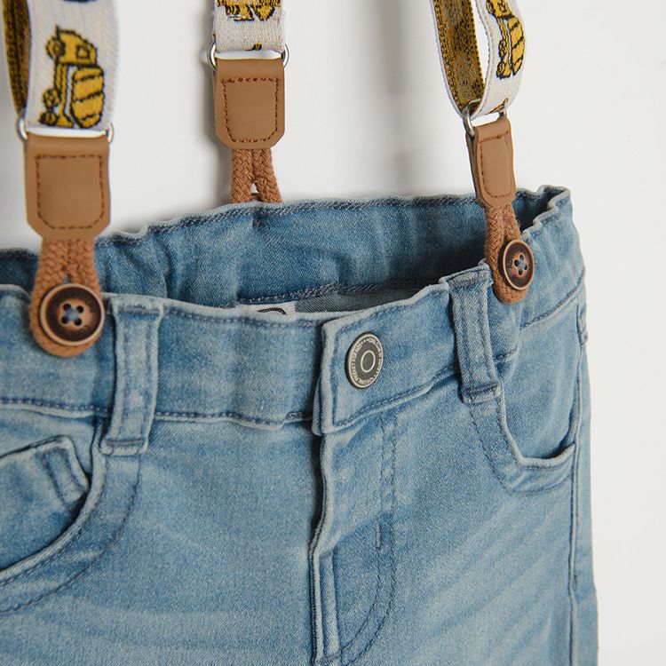 Denim pants with decorative straps