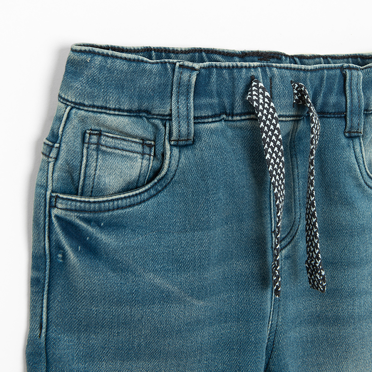 Denim pants with cord and side pocket