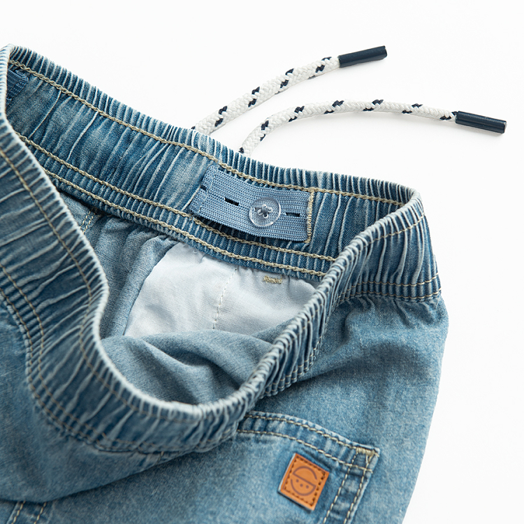 Denim trousers with cord