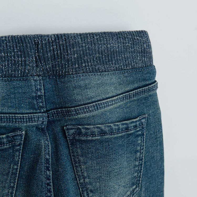 Denim trousers with floral lining