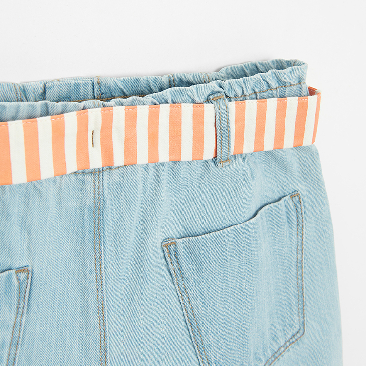 Blue denim shorts with striped white and pink belt
