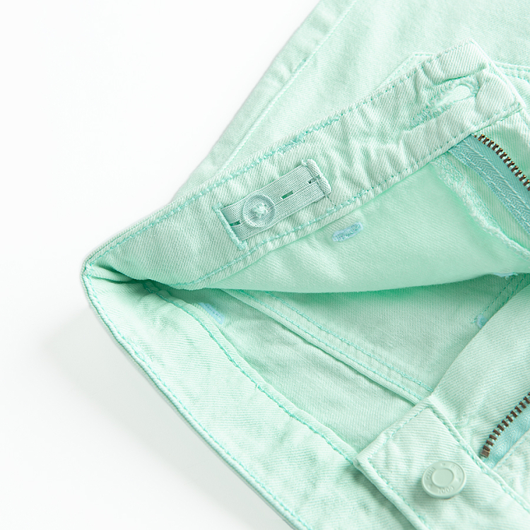 Turquoise denim shorts with back pockets on the front