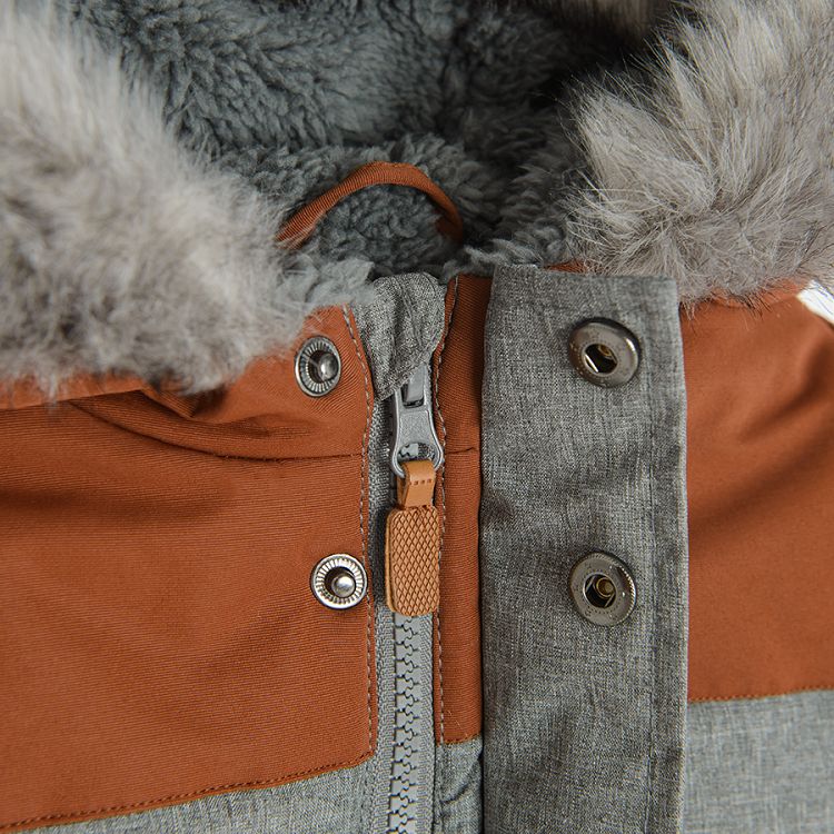 Grey and brown jacket with fur on the hood