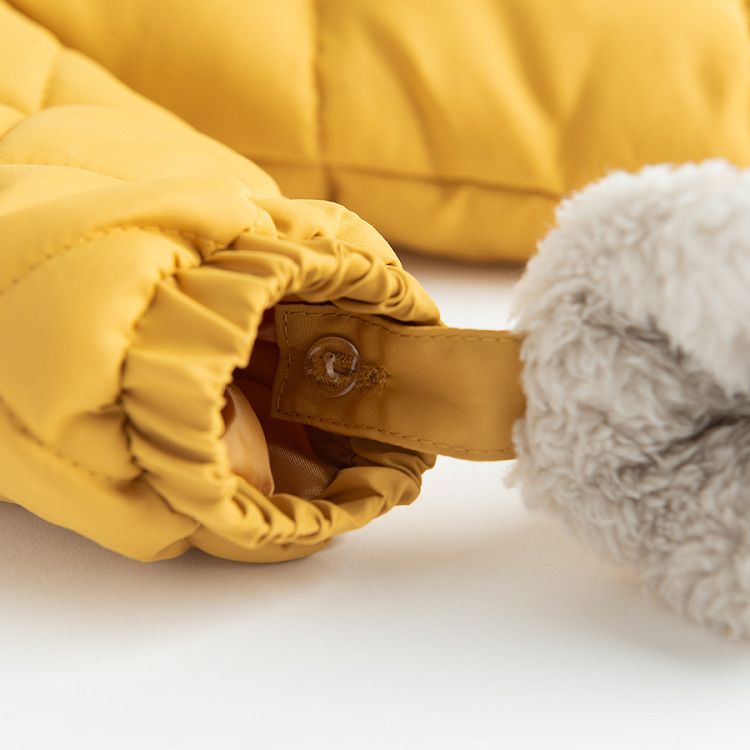 Yellow hooded snowsuit with mittens