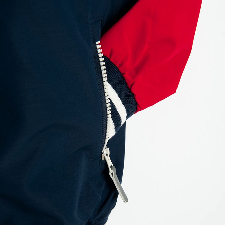 White, blue and red hooded zip through jacket