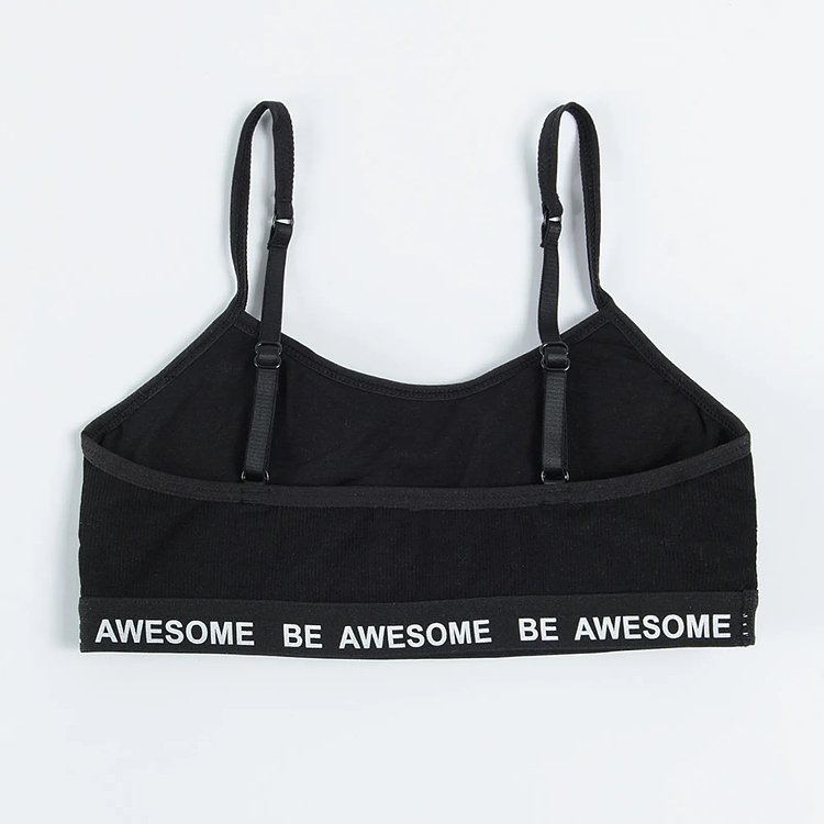 White and black bras with Be awesome print on the elastic band