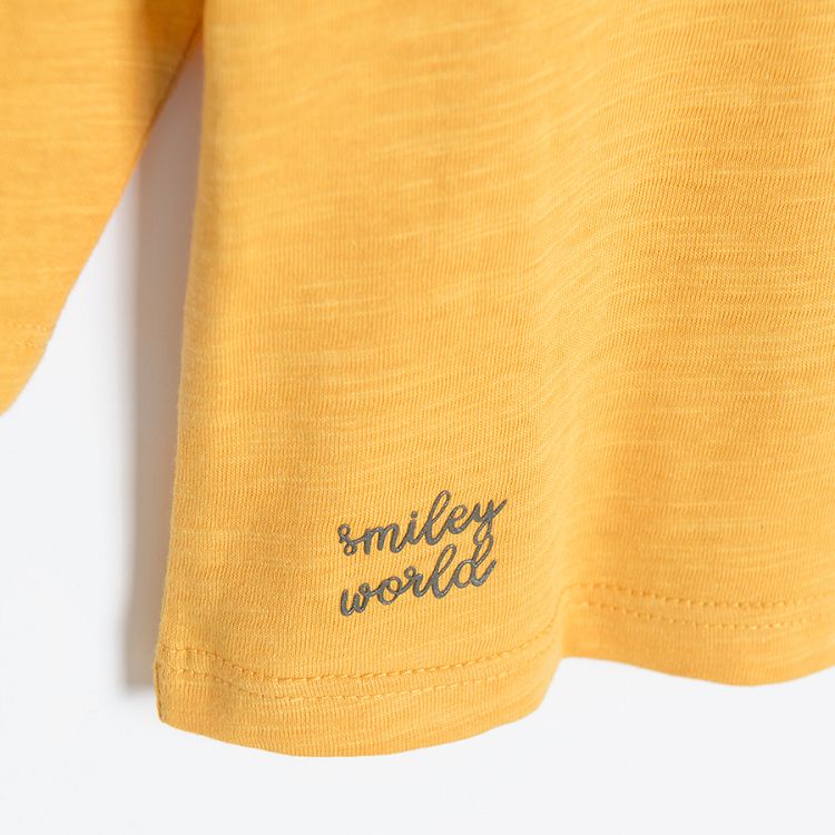 Smiley yellow long sleeve blouse