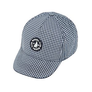 White and blue checked cap