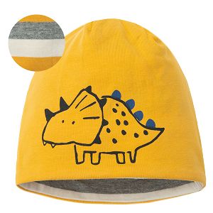 Yellow cap with dinosaur print and striped lining