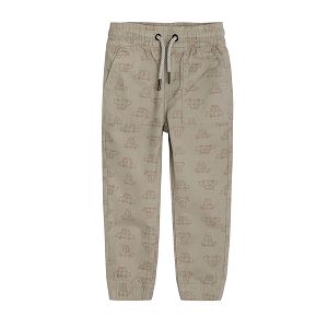 Beige trousers with cord and vehicles shapes