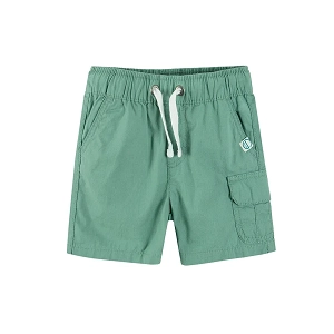 Green shorts with one side external pocket