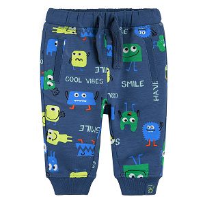 Navy blue jogging pants with happy creatures