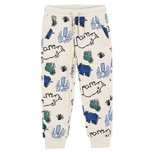 Beige jogging pants with adhustable waist and animals print