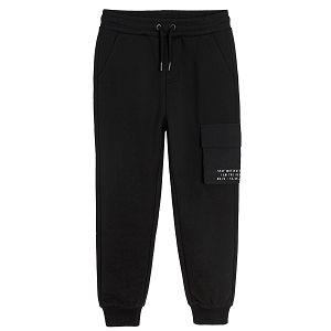 Black jogging pants with one external pocket