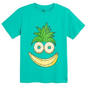 Green short sleeve T-shirt with banana and pineapple forming a face print